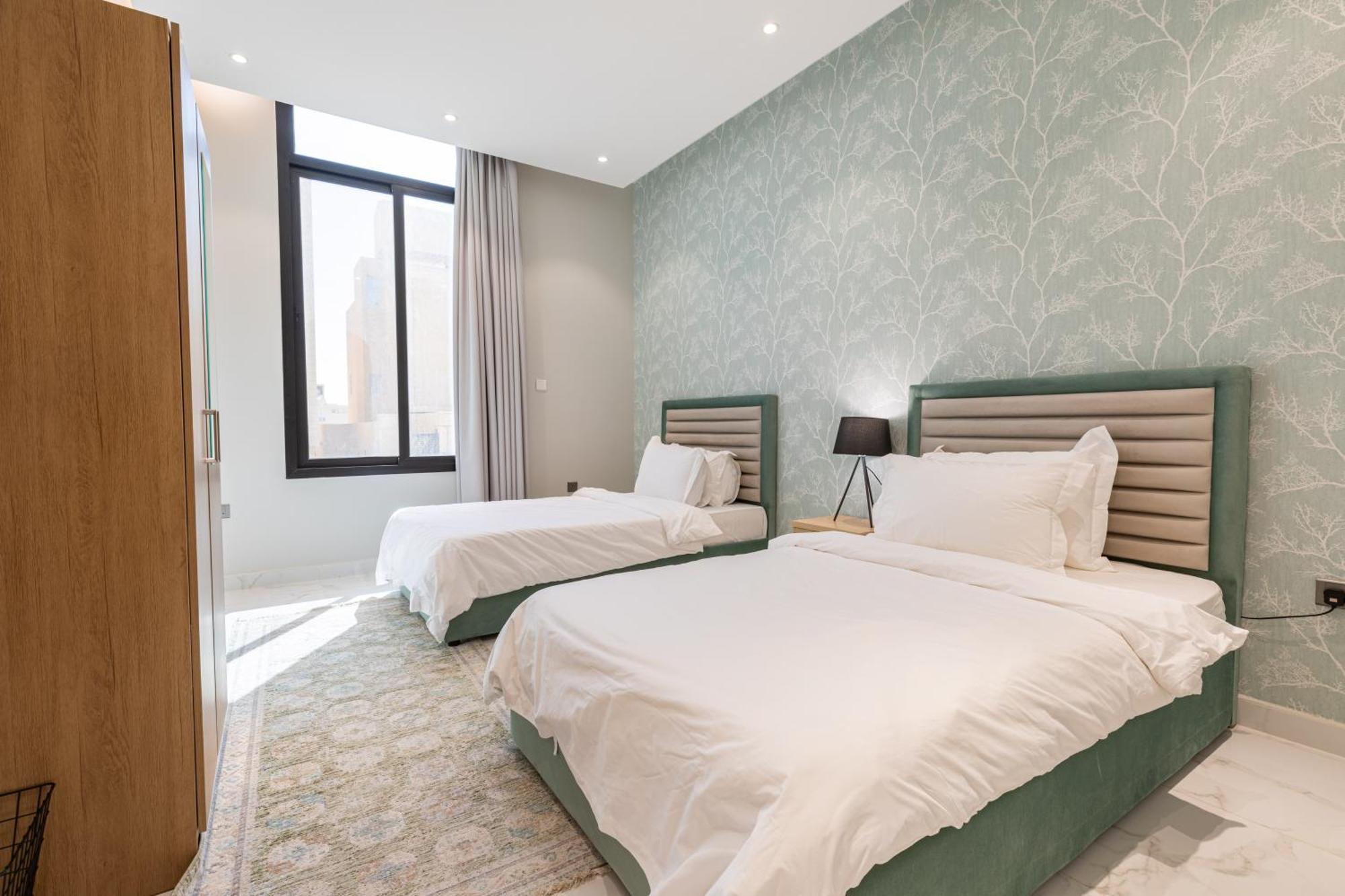 Amber Hospitality - Al Qairawan Apartment