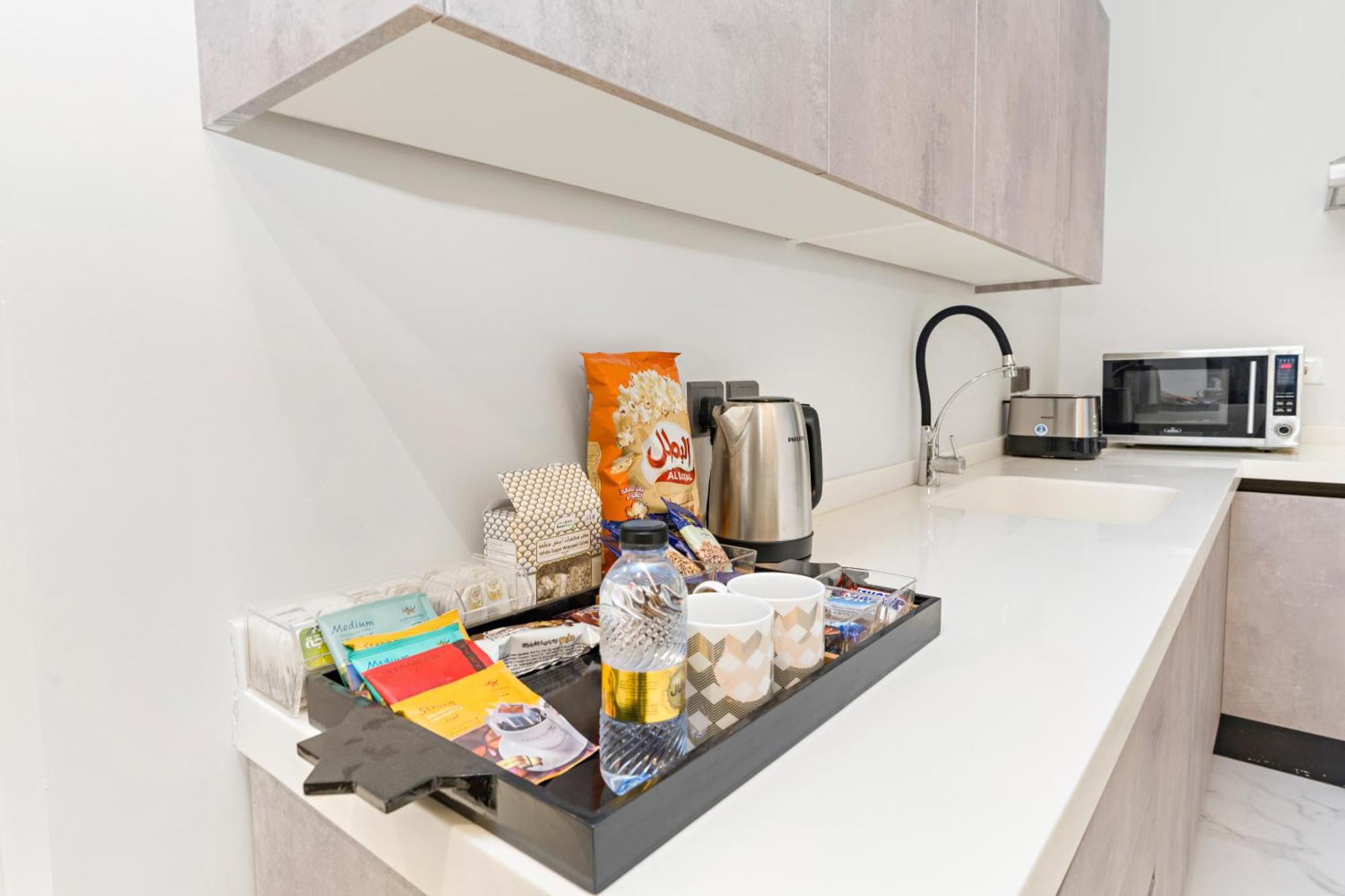 Amber Hospitality - Al Qairawan Apartment